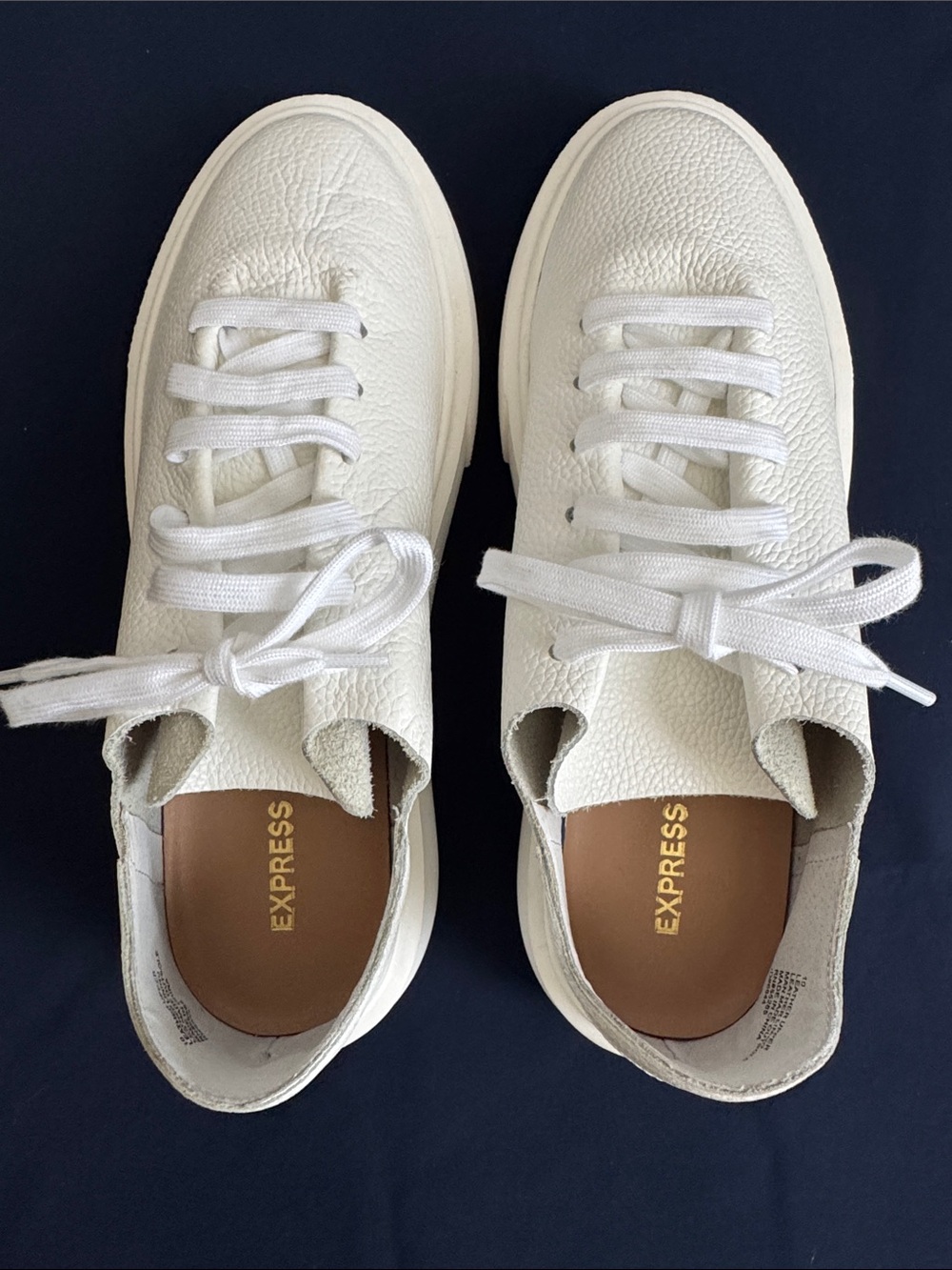 Express Women’s Ivory White Textured Leather Sneakers. They are new without tag.